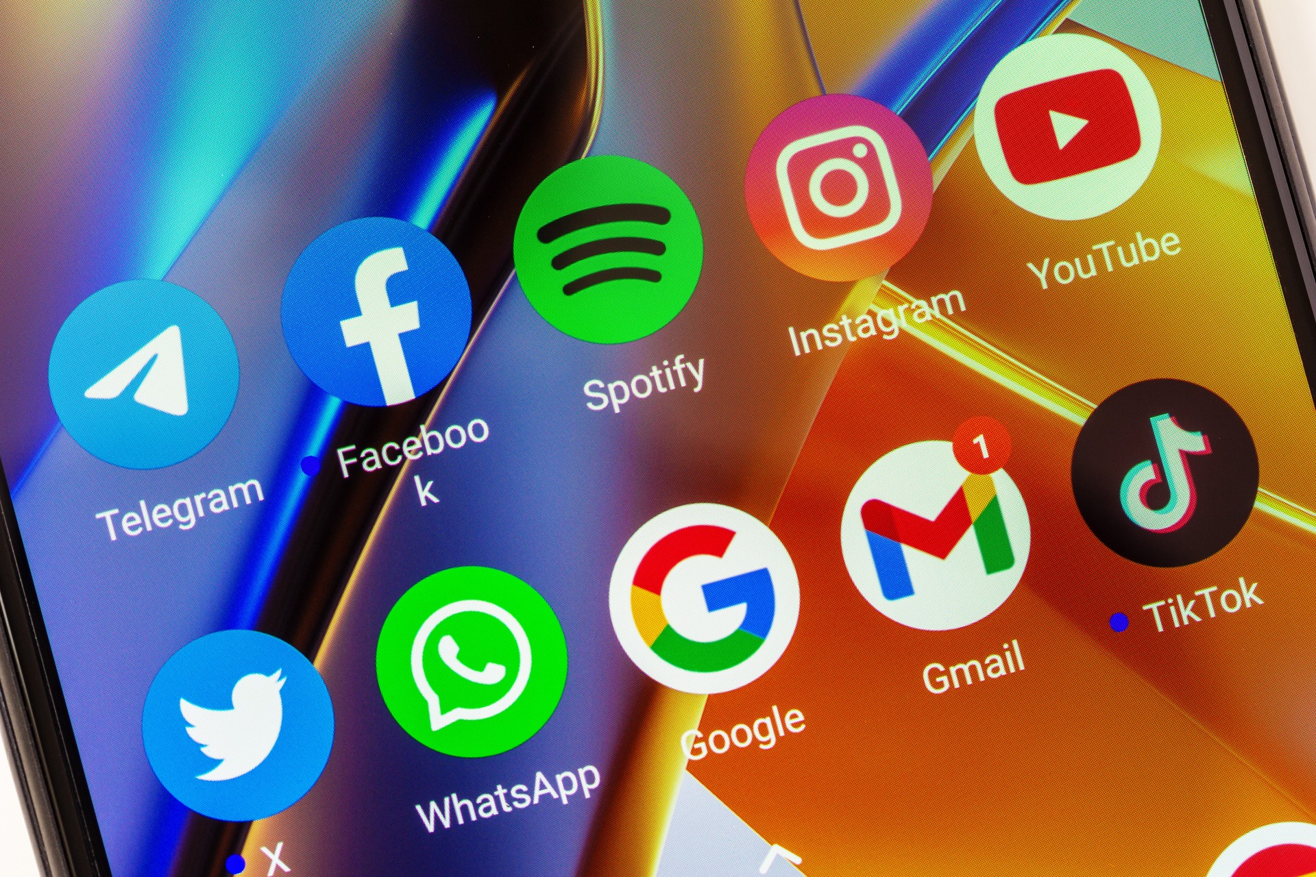 telegram, facebook, spotify, instagram, youtube, twitter, whatsapp, google, gmail, tik tok mobile app icons on xiaomi poco smartphone screen closeup